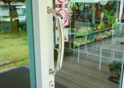 stainless steel handle on a glass door