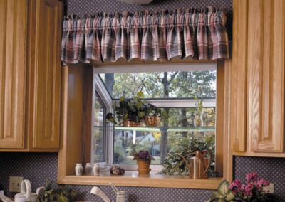 a kitchen with overlooking garden