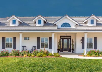 beautiful custom built home facade and yard