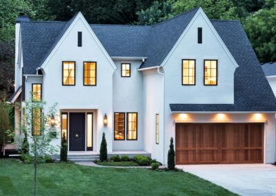 a white house with casement windows